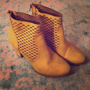 Mustard booties fit a bit big